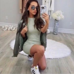 Original Carli Bybel x Missguided collection green ribbed bodycon dress.